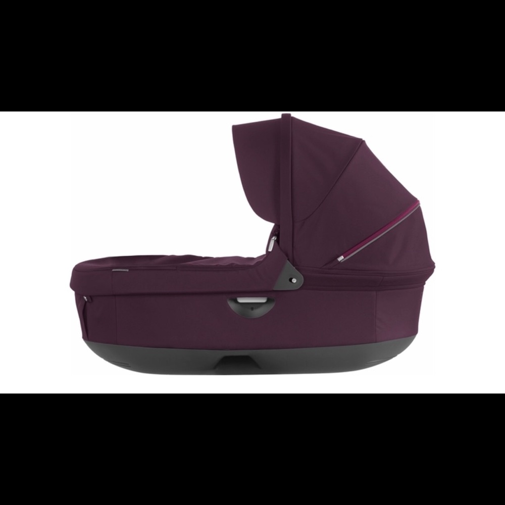 Purple stokke carry cot